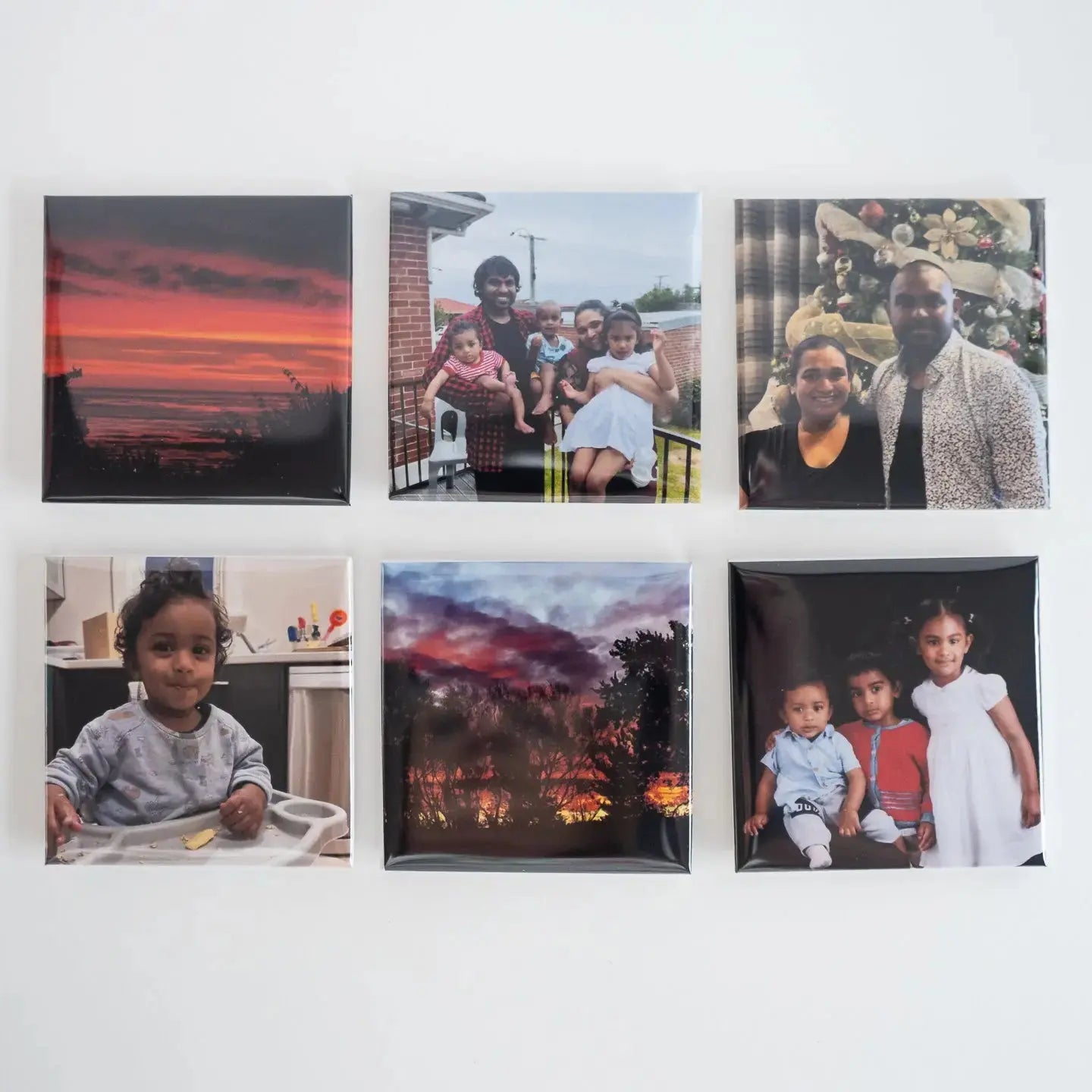 Set of 6 Personalised Photo Magnets from Attractive Memories featuring photos of a young family and some landscapes